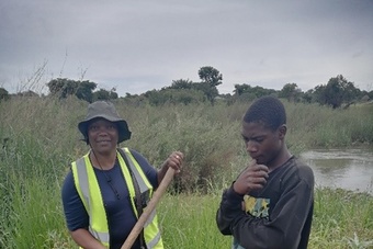 Rudo Violet Denga, one of RUFORUM's PhD students, conducting fieldwork in Bulangililo, along the Kafue River, Kitwe, Zambia